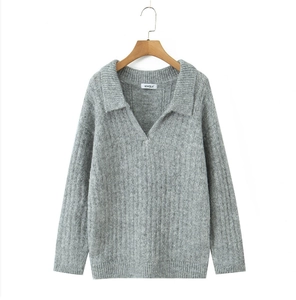 Detailed view of grey long-sleeved polo collar knit sweater with clear texture