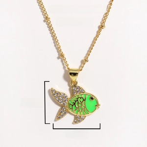 Detail of gold fish pendant with green enamel and rhinestones, 40+5cm chain length