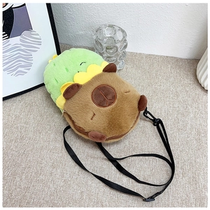 Detail of cute capybara and cactus plush crossbody bag with adjustable black strap