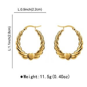 Detail view of gold heart twist hoop earrings with size measurements of 2.2cm and 2.8cm
