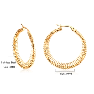 Detail view of 35x37mm gold plated stainless steel hoop earrings with spiral texture