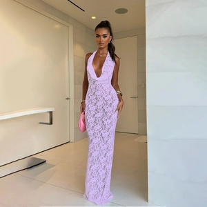 Close-up of elegant purple lace fabric texture on the halter backless maxi dress
