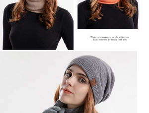 Detail of gray rib-knit winter set featuring thick thermal texture and leather logo patch