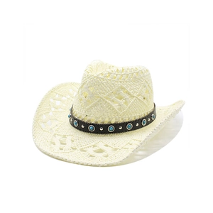 Detail of hollow-out straw hat with turquoise beads and black leather band