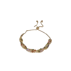Rainbow gemstone gold bracelet with colorful cubic zirconia and adjustable slider clasp