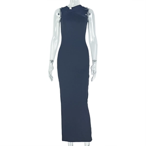 Detail of elegant navy blue bodycon maxi dress with pleated metal accents and halter neck