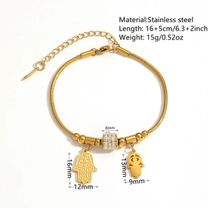 Bracelet Hamsa en acier inoxydable plaqué or 18 carats avec pavé de cristaux et perles