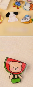 Detail of 4cm acrylic cartoon bear brooch showing dual-layer process and protective film peeling
