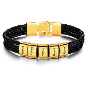 Detailed macro view of triple-layer braided leather bracelet with five gold custom name beads