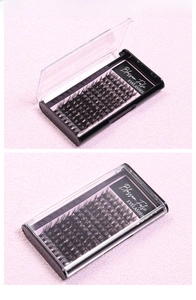 Detail of 12 rows individual cluster eyelashes in a professional black display box