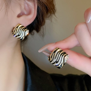 Vintage black enamel square earrings with gold plating and sparkling crystal accents