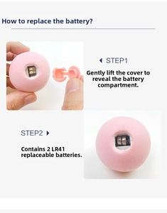 Detail of pink cat toy ball showing battery compartment with two LR41 button cells