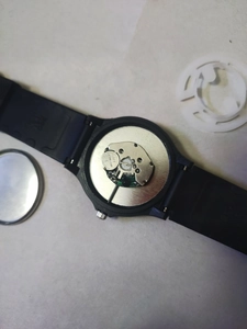 Detail view of the watch movement with 377 cell battery and OMSAN core mechanism
