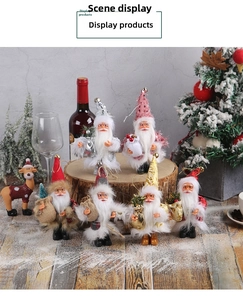 Charming Christmas gnomes display with festive plush outfits on rustic wood decor
