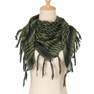 Detail of army green and black striped Keffiyeh scarf with decorative black tassels
