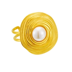 Detailed macro of vintage gold ring with spiral texture and center pearl inlay