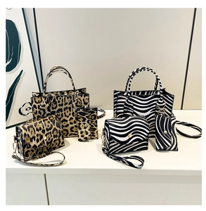 Detail of leopard and zebra print handbag sets with matching crossbody and card bags