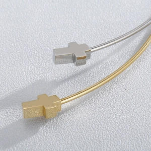 Minimalist bicolor stainless steel necklace with delicate gold and silver cross pendants