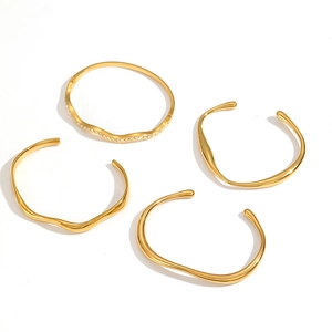 Minimalist 18k gold plated stainless steel wavy bangle set with geometric open design