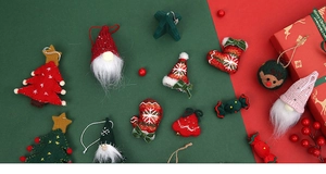 Detailed knit and wool felt Christmas ornaments including Santa and tree decorations