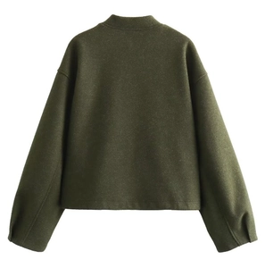 Back view detail of dark green short woolen jacket with high-quality fabric texture