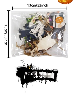 Macro shot of Halloween wooden ornaments set including pumpkin and spider web motifs