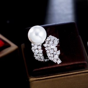 Luxury open ring with large white pearl and zircon accents in a premium jewelry box