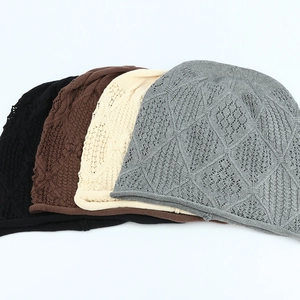Detailed knit texture and hollow diamond patterns of crochet beanies in four neutral colors