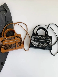 Bolsos de mano modernos con estampado de leopardo en marrón y negro para mujer