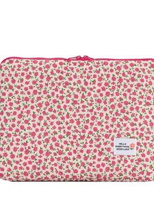 Beige laptop sleeve with pink floral print and quilted texture in a minimalist design