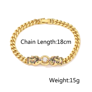 Detail view of gold leopard Cuban chain with color zircons showing 18cm length