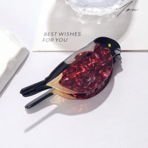 Artistic flamingo shaped acetic acid hair claw clip with red and black marble texture