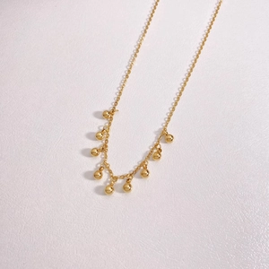 Elegant gold beaded fringe necklace in minimalist stainless steel for women