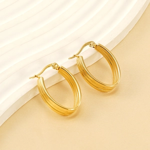 Élégantes boucles d'oreilles ovales en acier inoxydable doré 18 carats avec nervures