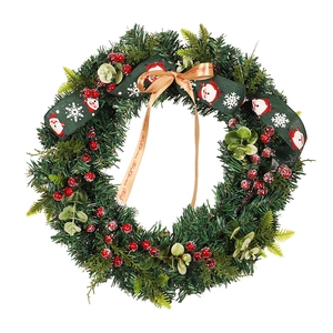 Artificial Christmas wreath with eucalyptus leaves, red berries, and Merry Christmas ribbon