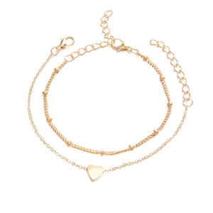 Double-layered gold bohemian heart charm bracelet with dainty beads and lobster clasp