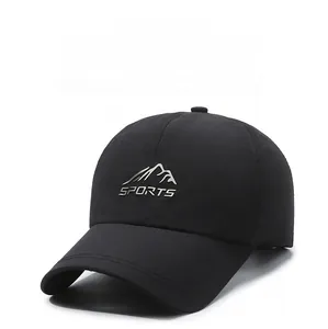 Detail of black quick-dry baseball cap featuring a raised SPORTS mountain graphic logo