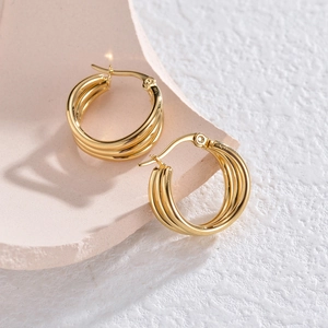 Three-layered hollow gold hoop earrings made of titanium steel for a stylish look