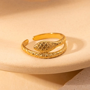 Golden titanium steel snake ring with textured scales and an adjustable open design