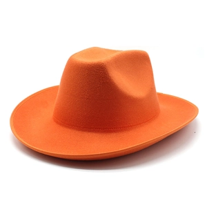 Detail of orange wool felt cowboy hat showing its textured 8cm wide brim and crown