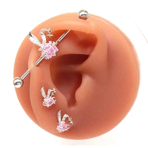 Silver industrial piercing bar with pink heart gem and star rabbit planet design