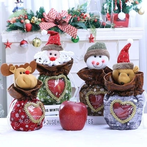 Set of four plush Christmas gift bags with 3D characters and heart-shaped window