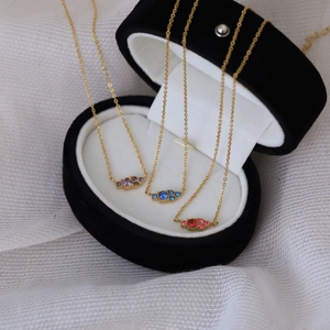 Classic birthstone necklace with three styles of colorful gems and 18k gold plating