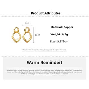 Macro detail of geometric twisted drop earrings showing 3.5cm by 2cm dimensions and weights
