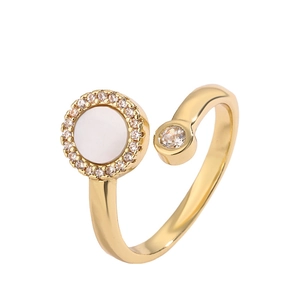 Adjustable gold plated open ring featuring a white shell disc and a sparkling zircon stone