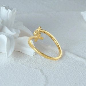Close-up of golden S925 sterling silver ring showing the authentic certification mark