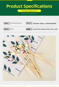 Detail of colorful football-themed bamboo fruit picks for creative dessert decoration