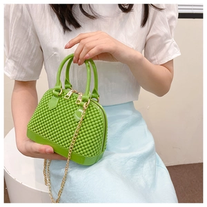 Green shell-shaped PVC jelly bag with gold chain strap and textured bubble finish