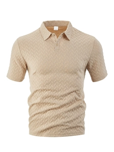 Macro detail of khaki polo shirt showing herringbone jacquard texture and polo collar