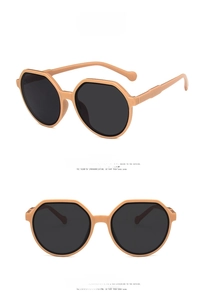 Detail view of retro polygonal milk tea beige sunglasses with dark grey lenses